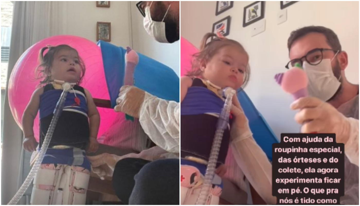 Maria Guilhermina, filha de Juliano e Leticia Cazarré, em pé com uma roupa especial